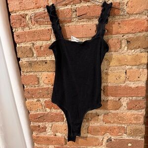 Stylish Black Ruffled Women's Bodysuit
